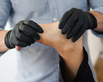 Manual Therapy a person performing orthopedic manual therapy